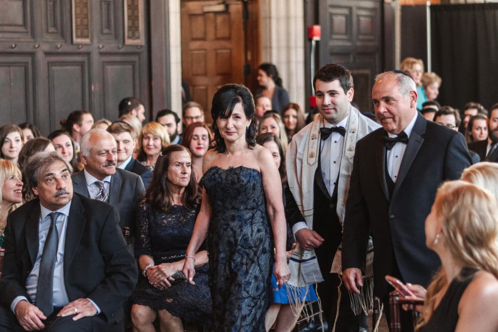 wedding-entrance-groom-with-parents-at-ceremony