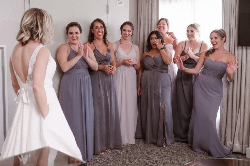 first-look-with-bridal-party-photo-by-suess-moments-photographer