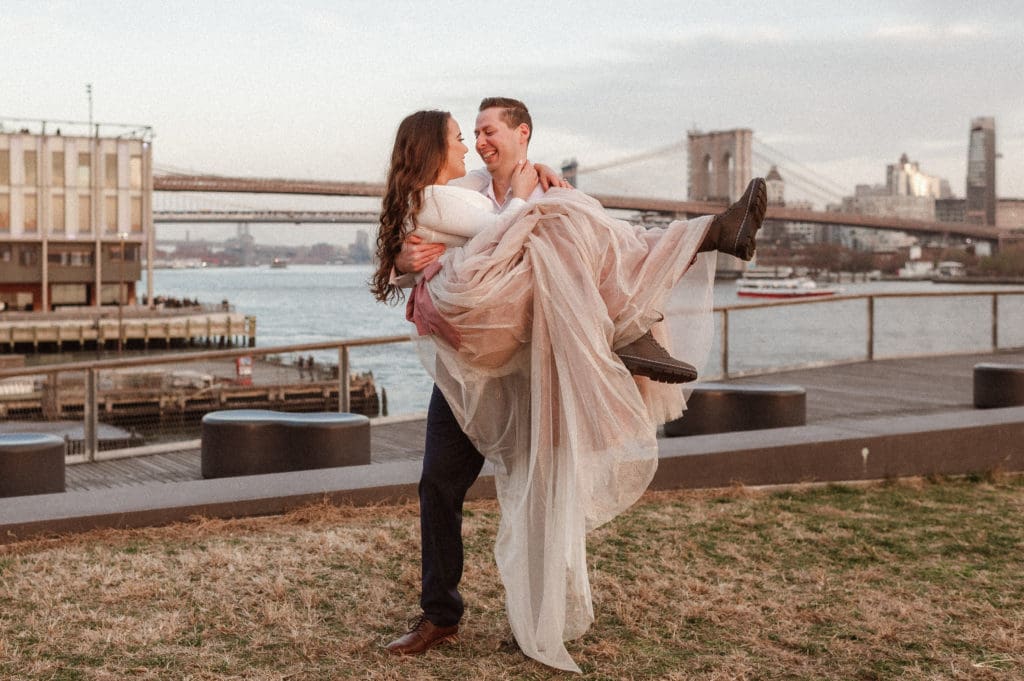 pier-15-engagement-photos-brooklyn-bridge-view-suess-moments-nyc-photographer