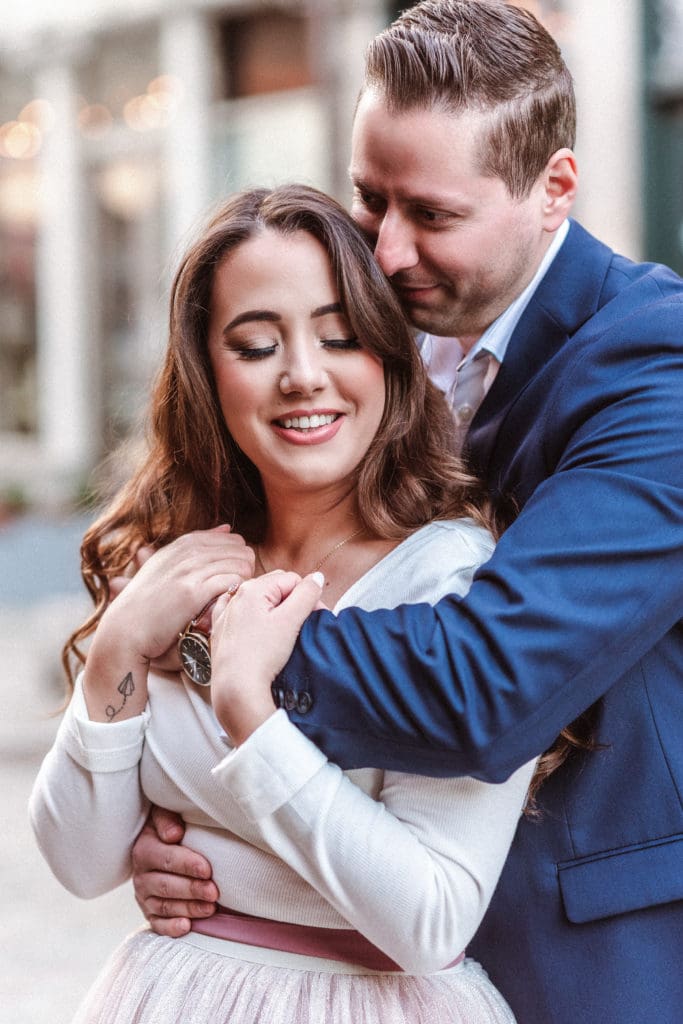 cute-couple-hugging-from-behind-pose-suess-moments-nyc-photography