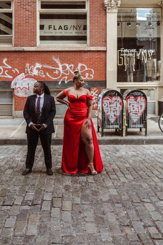 soho-nyc-engagement-photos-iconic-red-dress-couple-lesbian-lgbqt-photography-nyc-suess-moments