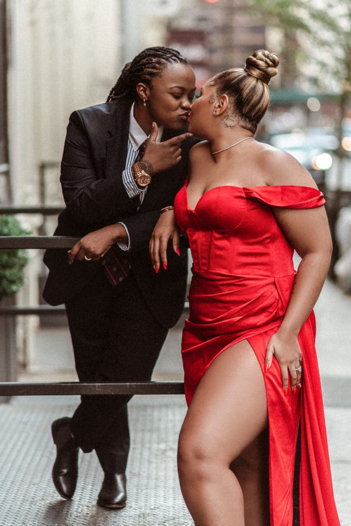 kiss-engagement-photos-red-dress-couple-suess-moments