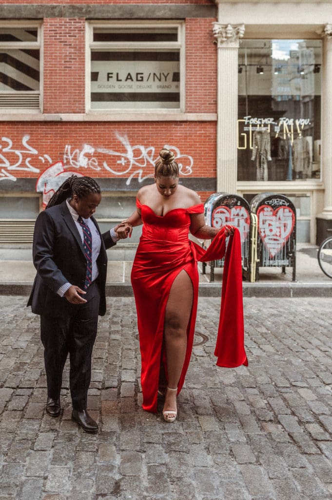soho-nyc-engagement-photos-iconic-red-dress-couple-lesbian-lgbqt-photography-nyc-suess-moments