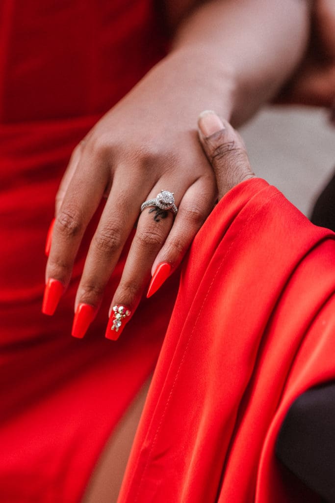 soho-nyc-engagement-photos-iconic-red-dress-couple-lesbian-lgbqt-photography-nyc-suess-moments