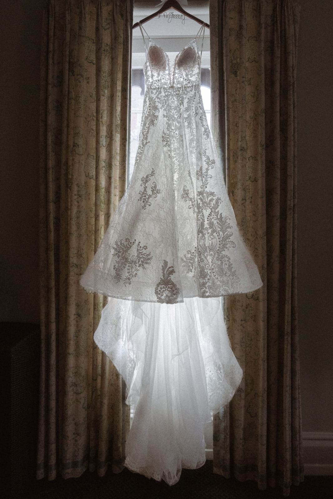 wedding-dress-hung-in-window-at-whitby-castle-bridal-suite