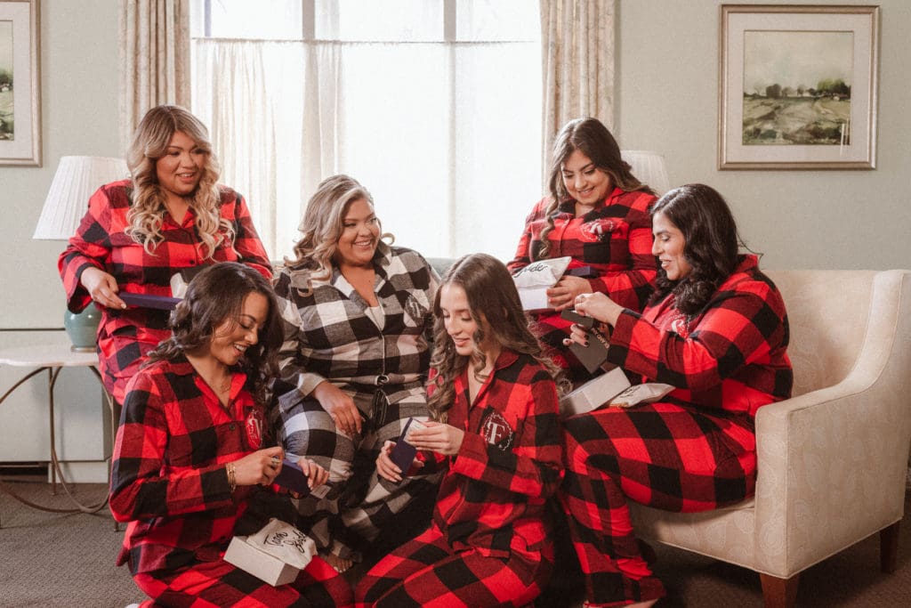 fun-bridal-prep-photos-with-bridesmaids-at-whitby-castle-bridal-suite-suess-moments-photography-new-york-new-jersey