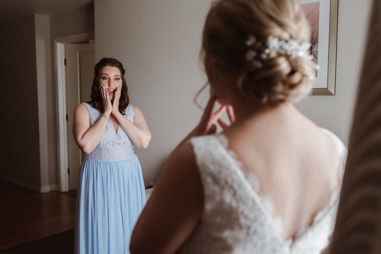 first-look-maid-of-honor-and-bride