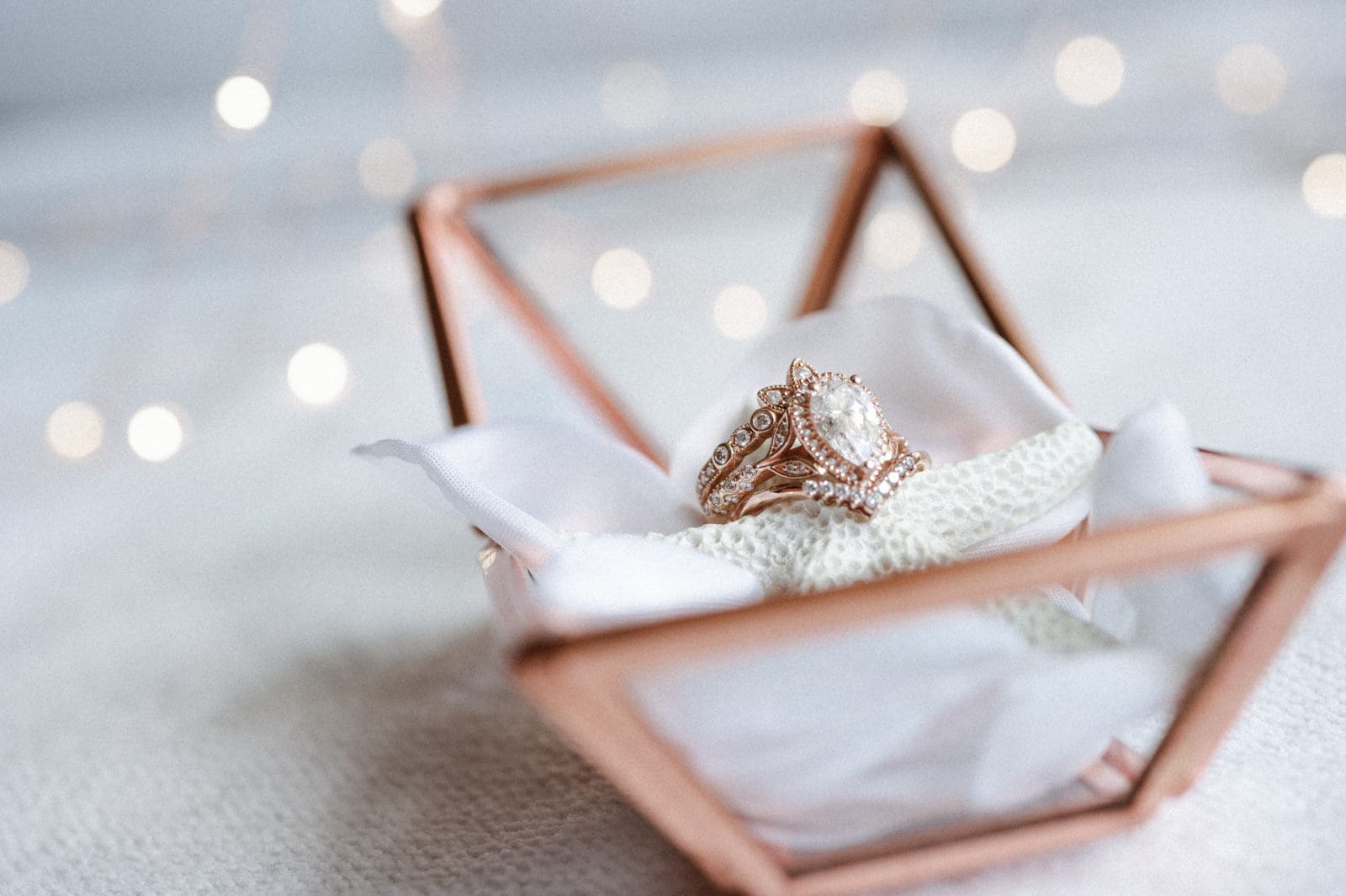 ring-shot-with-fairylights-by-suess-moments-wedding-photographer