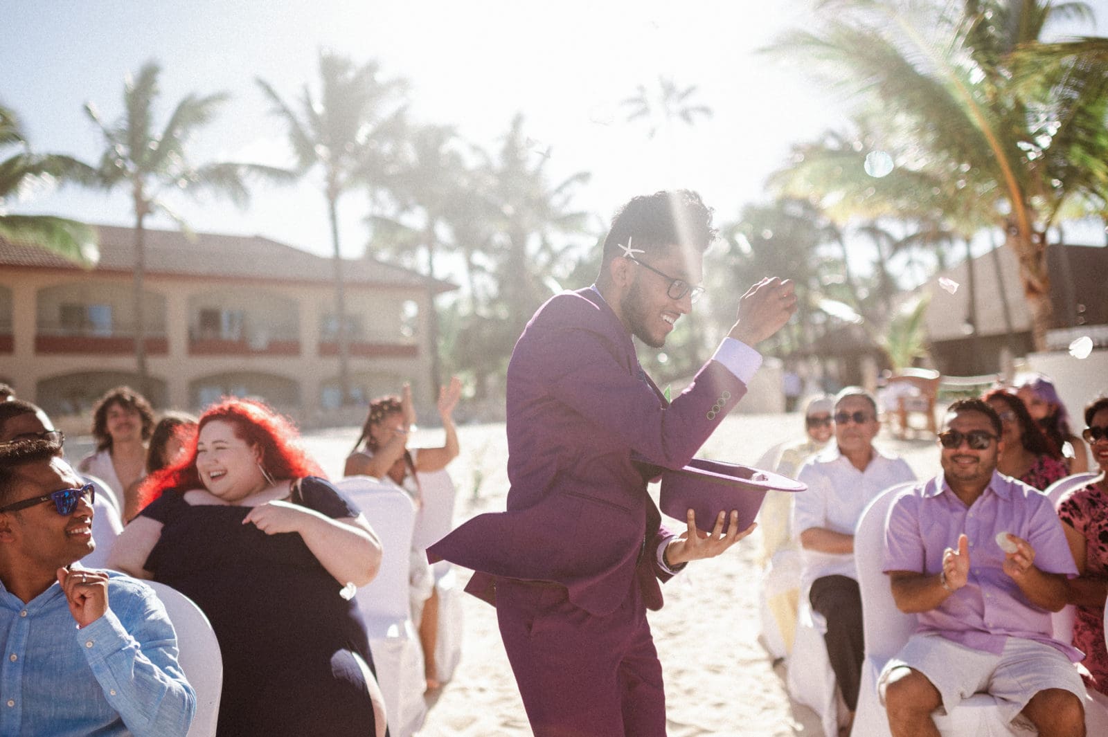 fun-flower-boy-coming-down-aisle-tossing-flowers-by-suessmoments