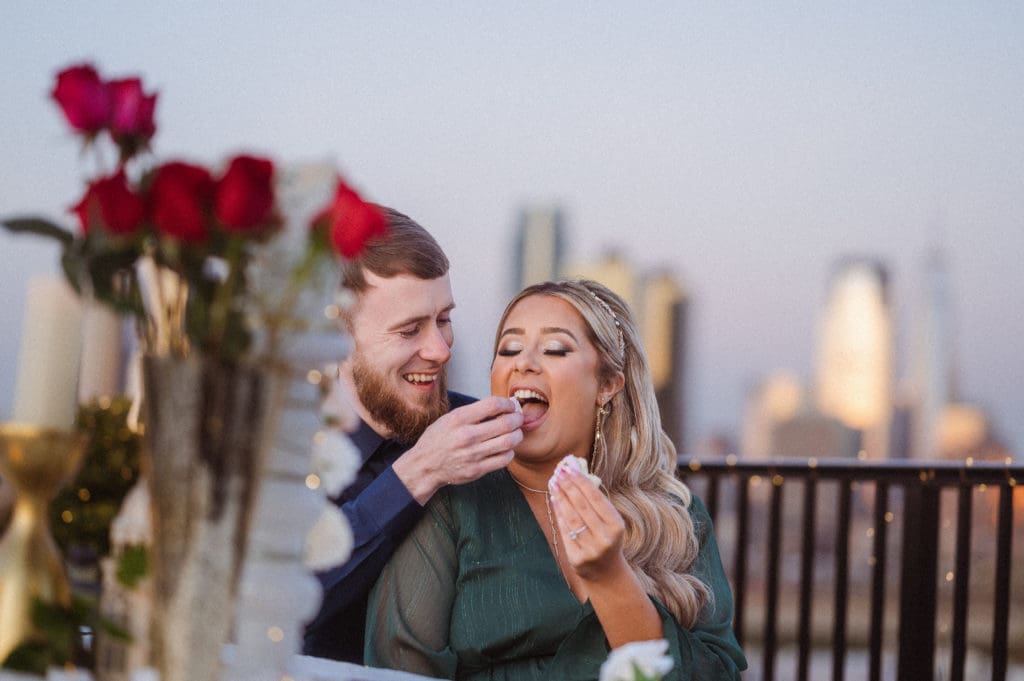 nyc-skyline-views-rooftop-jersey-city-engagement-photos-by-suess-moments