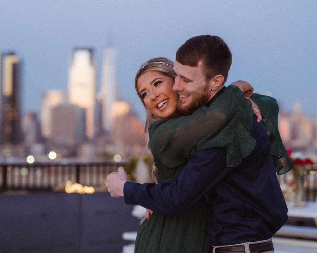 nyc-skyline-views-rooftop-jersey-city-engagement-photos-by-suess-moments