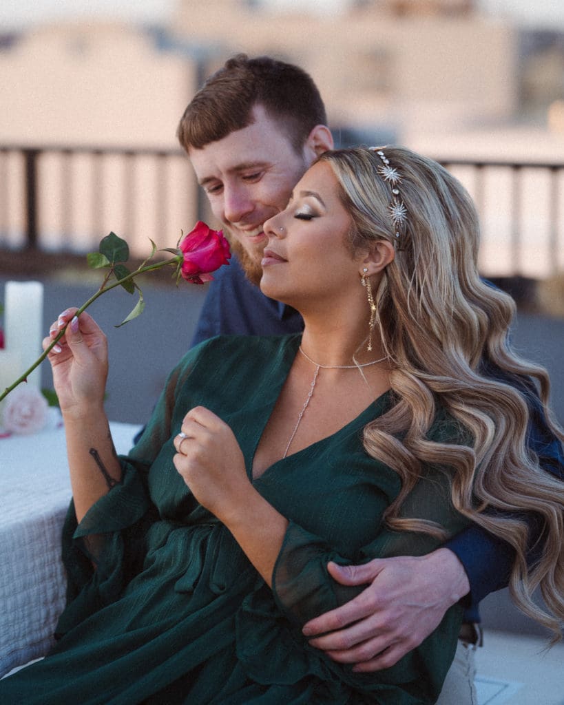 red-rose-sniff-engagement-photos