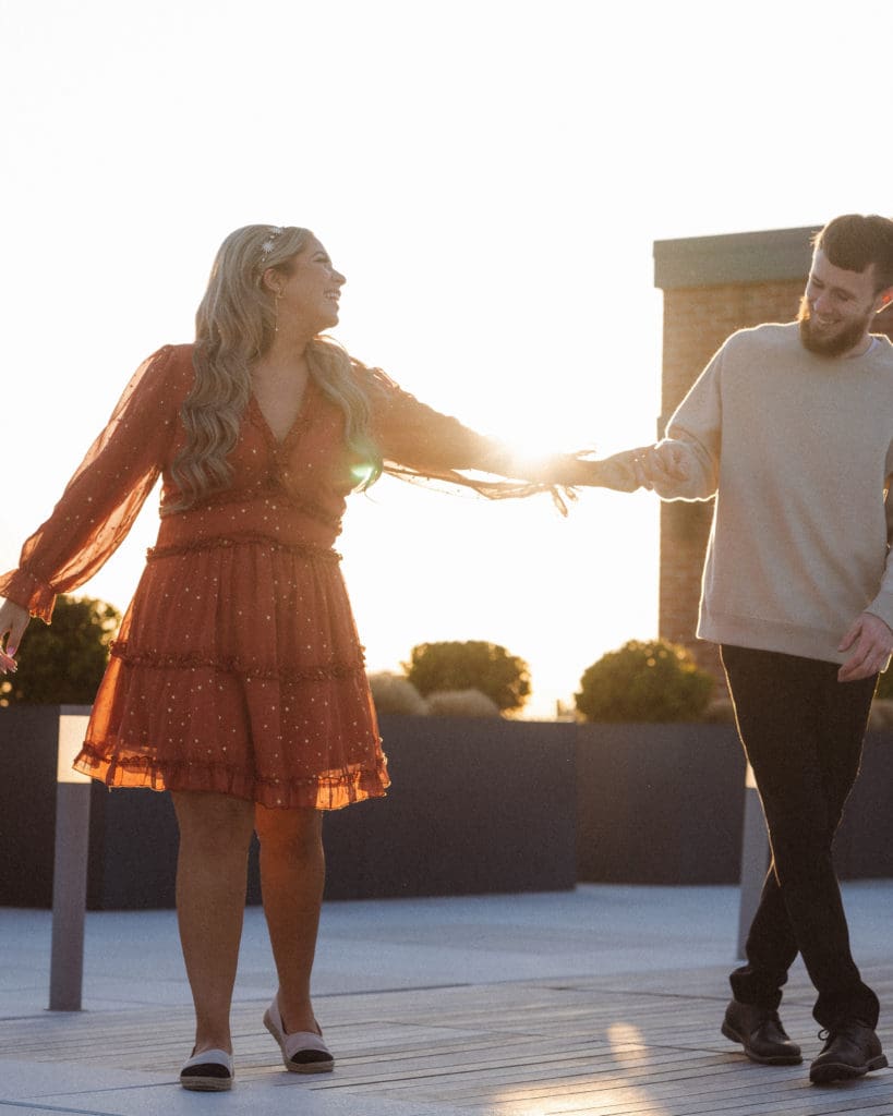 nyc-skyline-views-rooftop-jersey-city-engagement-photos-by-suess-moments