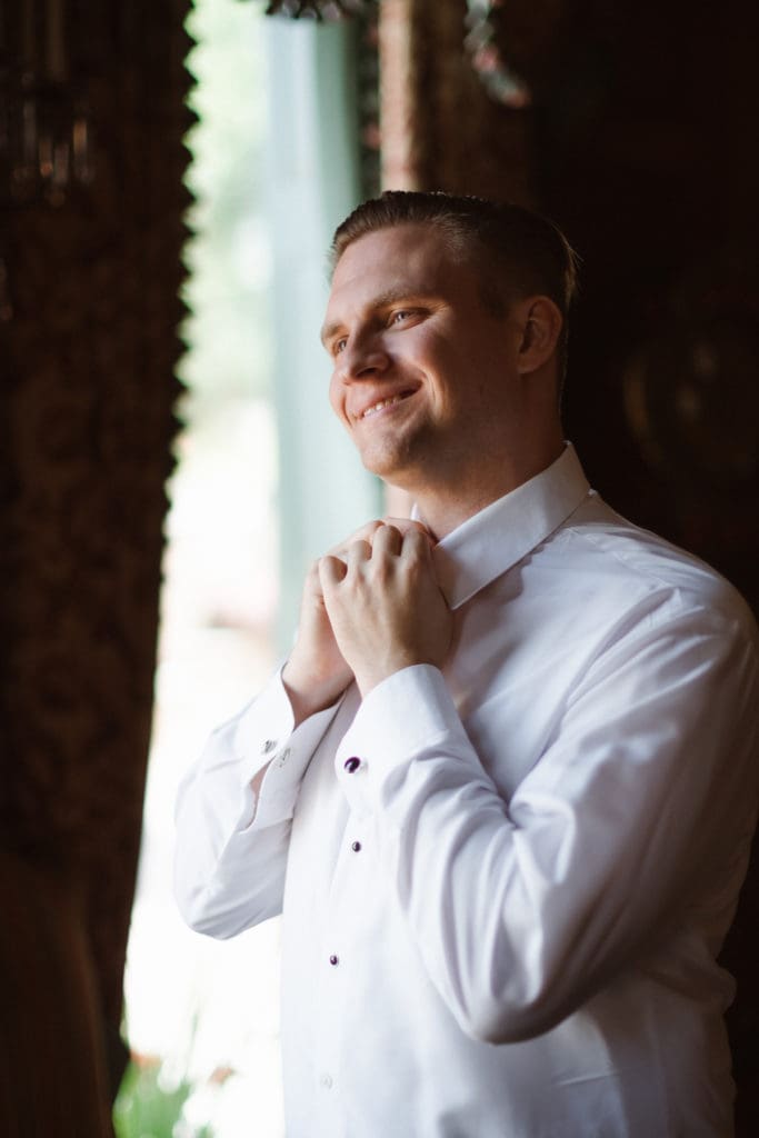groom-prep-portrait-with-window-light