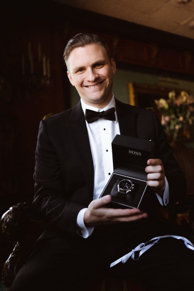 groom-opening-gift-watch