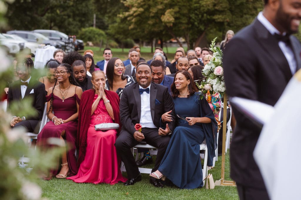 outdoor-wedding-ceremony-at-whitby-castle-rye-new-york-photos-by-suess-moments-photographer