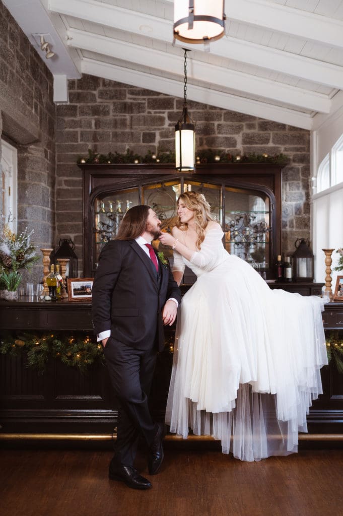 the-bar-inside-the-whitby-castle-with-bride-and-groom-suess-moments-wedding-photographer