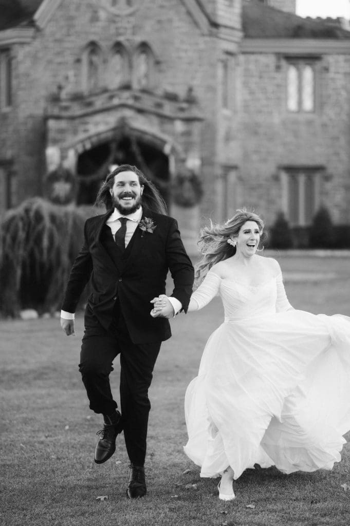whitby-castle-wedding-running-couple--suess-moments-wedding-photographer