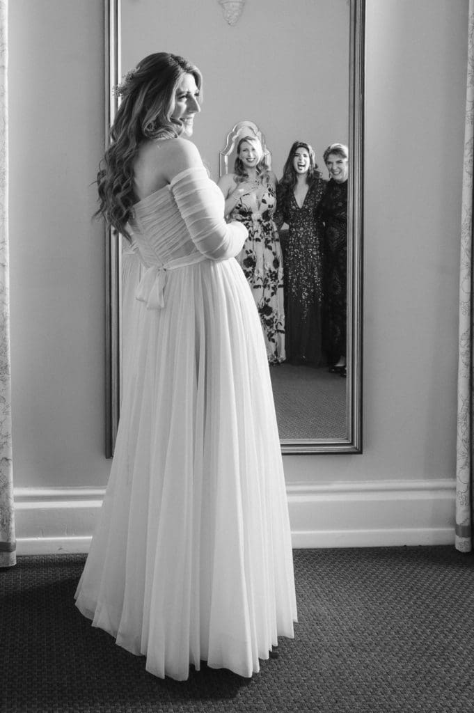 first-look-with-mom-and-bridesmaids--suess-moments-wedding-photographer