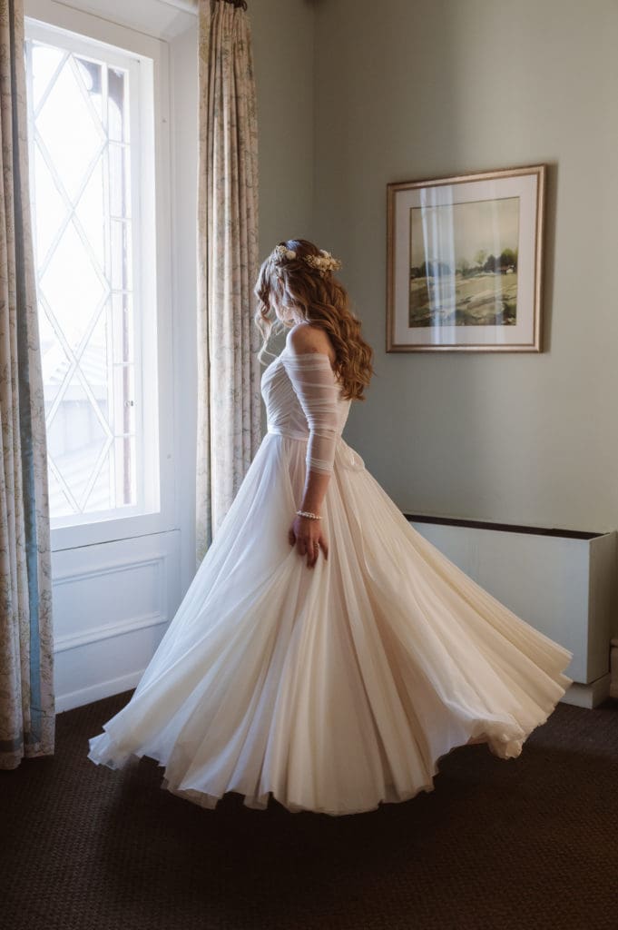 enchanting-beautiful-bride-portrait-by-window-suess-moments-wedding-photographer