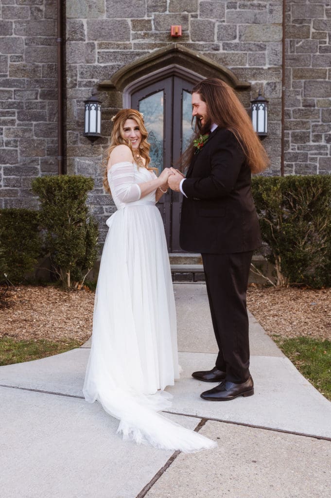 winter-wedding-outside-whitby-castle-suess-moments-wedding-photographer
