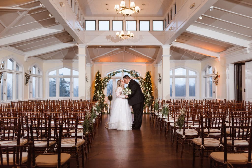 indoor-wedding-ceremony-at-the-whitby-castle-rye-new-york-by-suess-moments