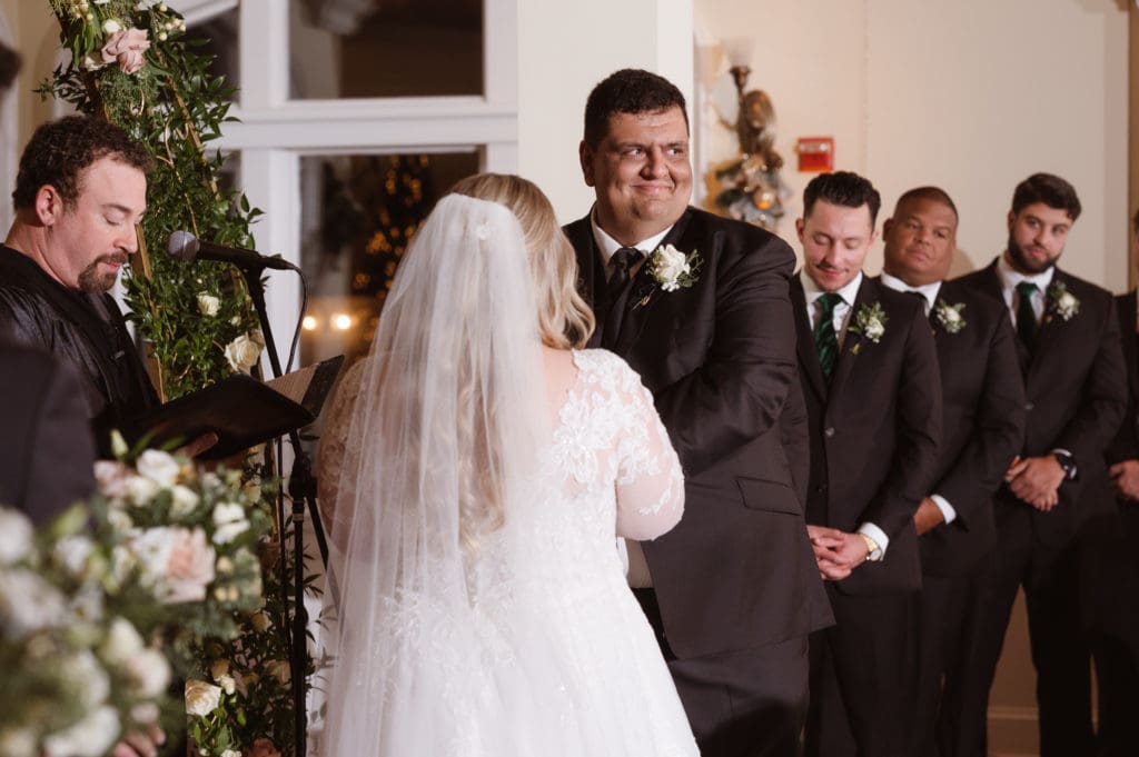 indoor-wedding-ceremony-at-the-whitby-castle-rye-new-york-by-suess-moments
