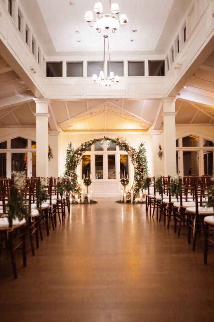 indoor-wedding-ceremony-at-the-whitby-castle-rye-new-york-by-suess-moments