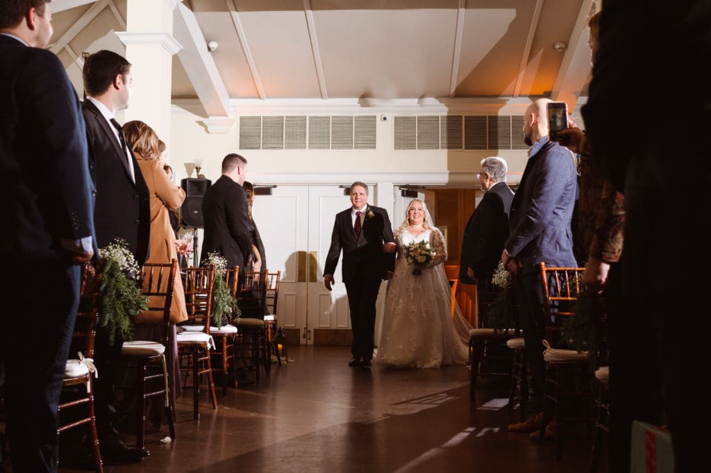 indoor-wedding-ceremony-at-the-whitby-castle-rye-new-york-by-suess-moments