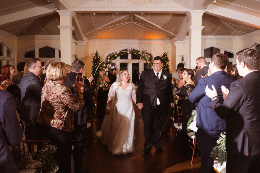 indoor-wedding-ceremony-at-the-whitby-castle-rye-new-york-by-suess-moments