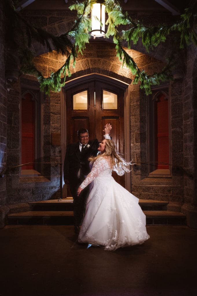night-time-whitby-castle-photo-of-bride-and-groom