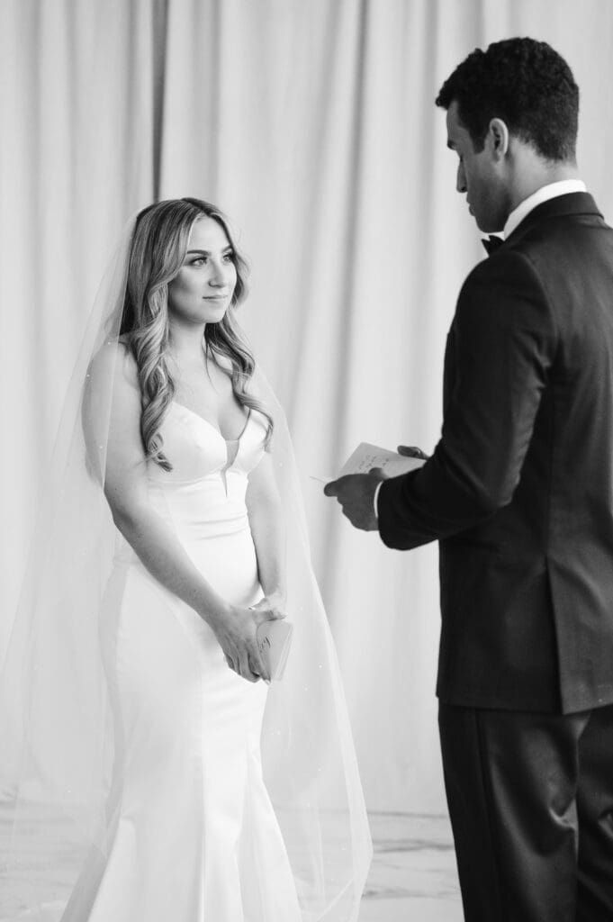 reading-vows-in-private-wedding-idea