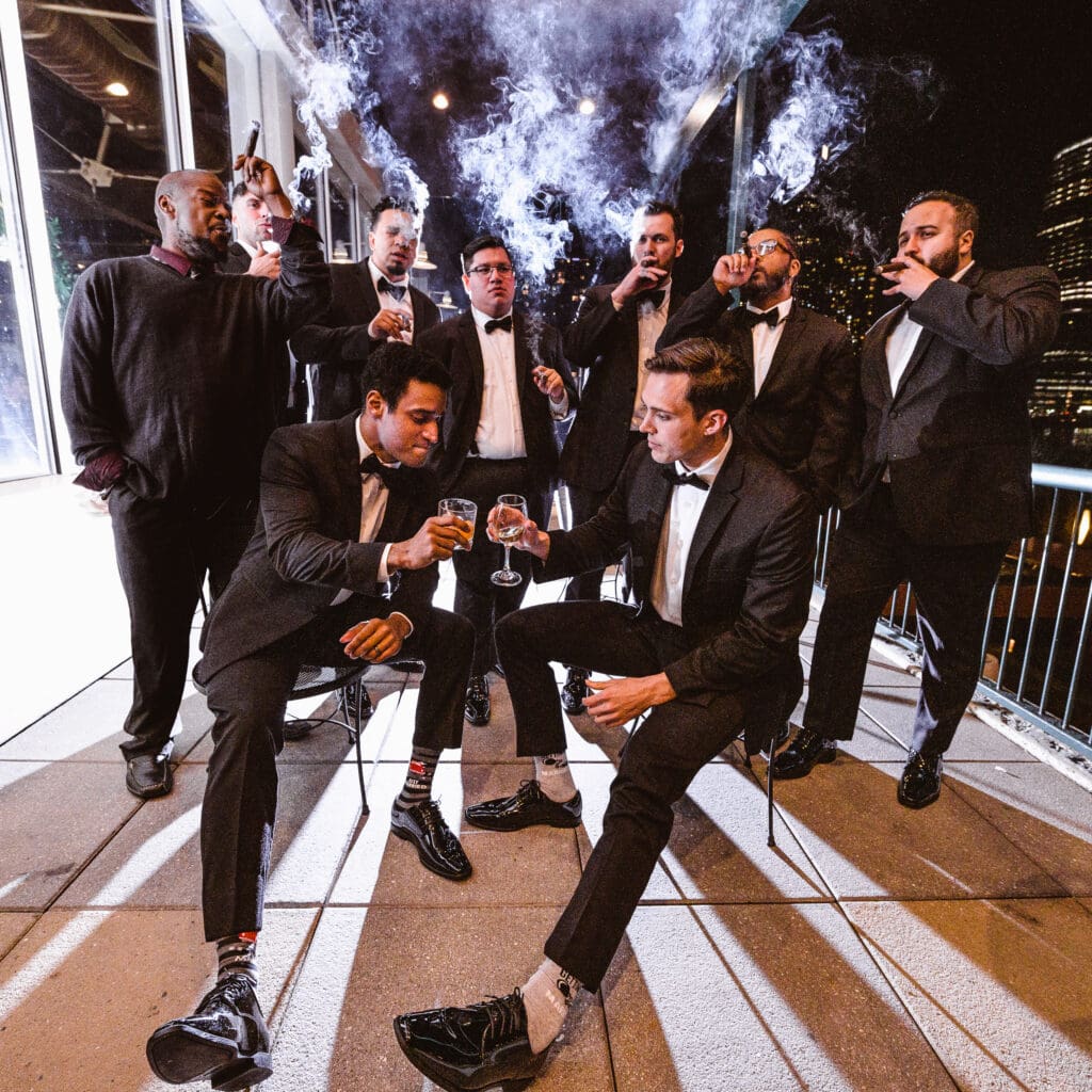 night-time-smoke-cigar-photo-of-groomsmen