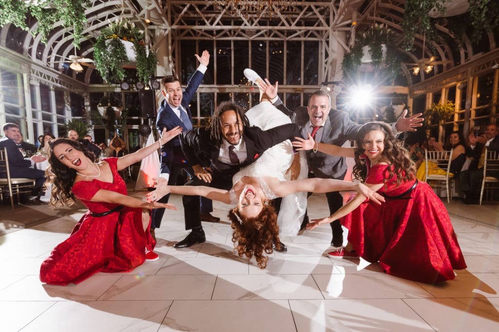 surprise-wedding-dance-nj-photographer-suess-moments-candid-photos-at-the-madison-hotel-conservatory