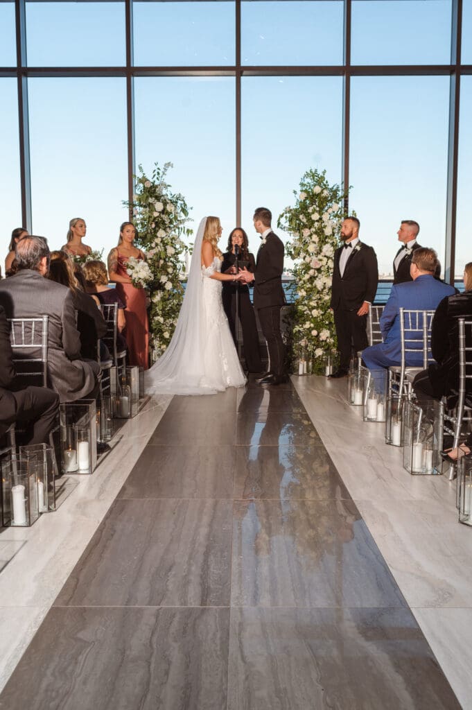 wedding-ceremony-indoors-at-hudson-house-jersey-city-waterfront-nyc-skyline