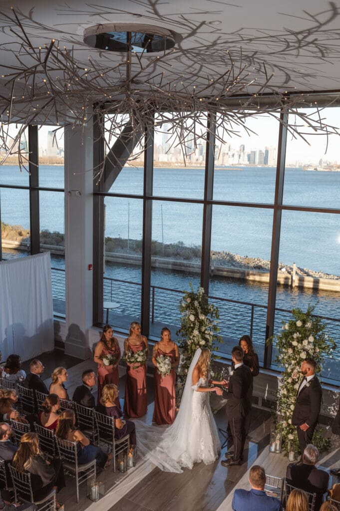 wedding-ceremony-indoors-at-hudson-house-jersey-city-waterfront-nyc-skyline