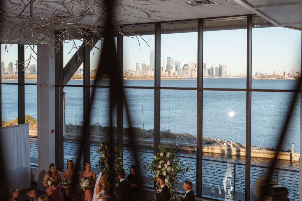 wedding-ceremony-indoors-at-hudson-house-jersey-city-waterfront-nyc-skyline