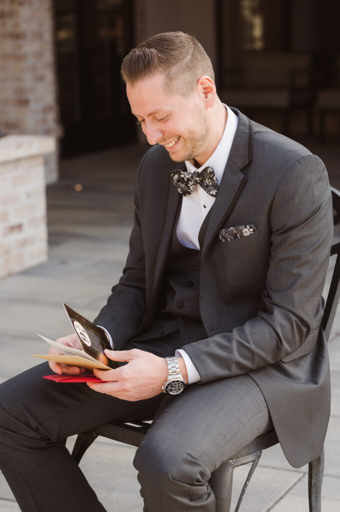 groom-reading-letter-from-bride