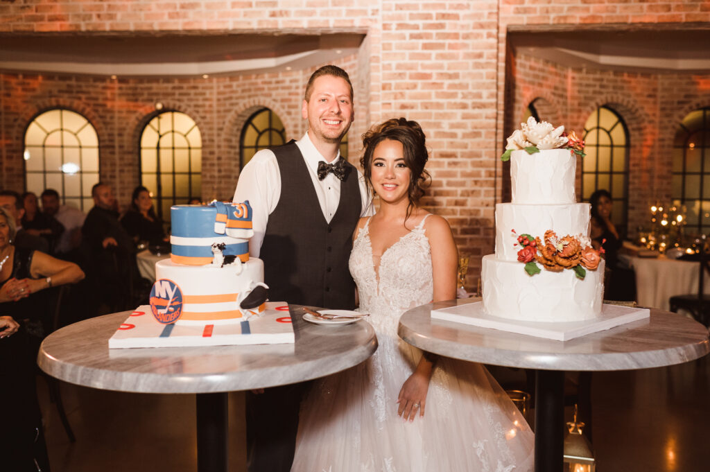 bride-and-groom-with-two-cakes