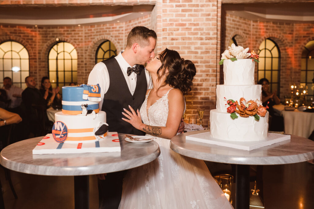 bride-and-groom-with-two-cakes