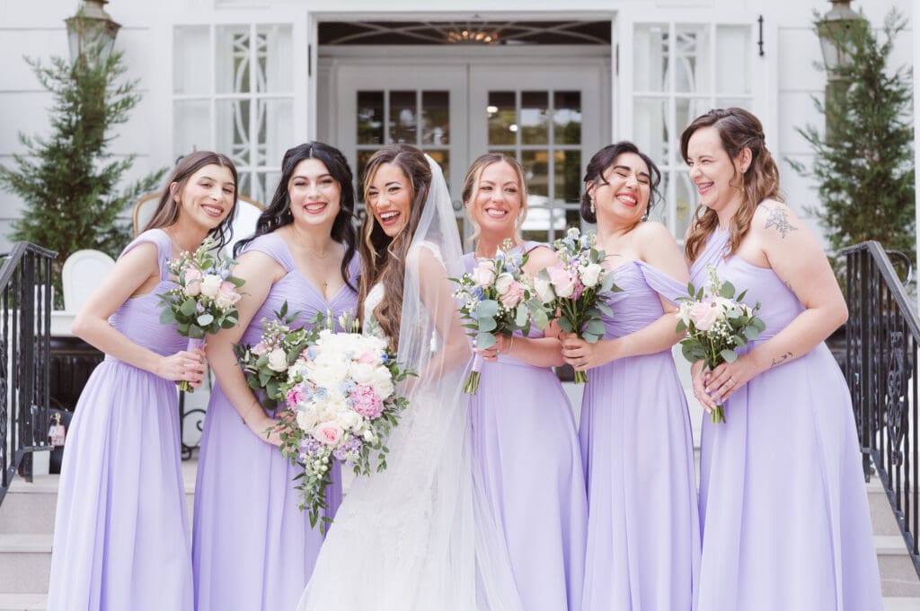 bridesmaids-on-steps-at-the-briarcliff-manor-ny-wedding-photos