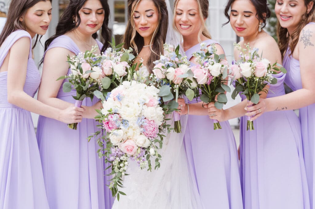 bridesmaids-on-steps-at-the-briarcliff-manor-ny-wedding-photos