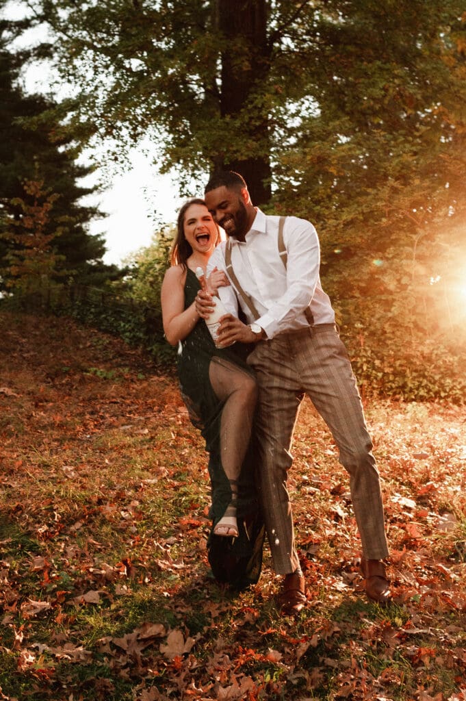 champagne-pop-engagement-photo-using-off-camera-flash-mag-mod-by-suess-moments