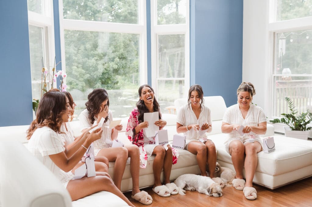 bride-prep-wearing-robes-opening-gifts