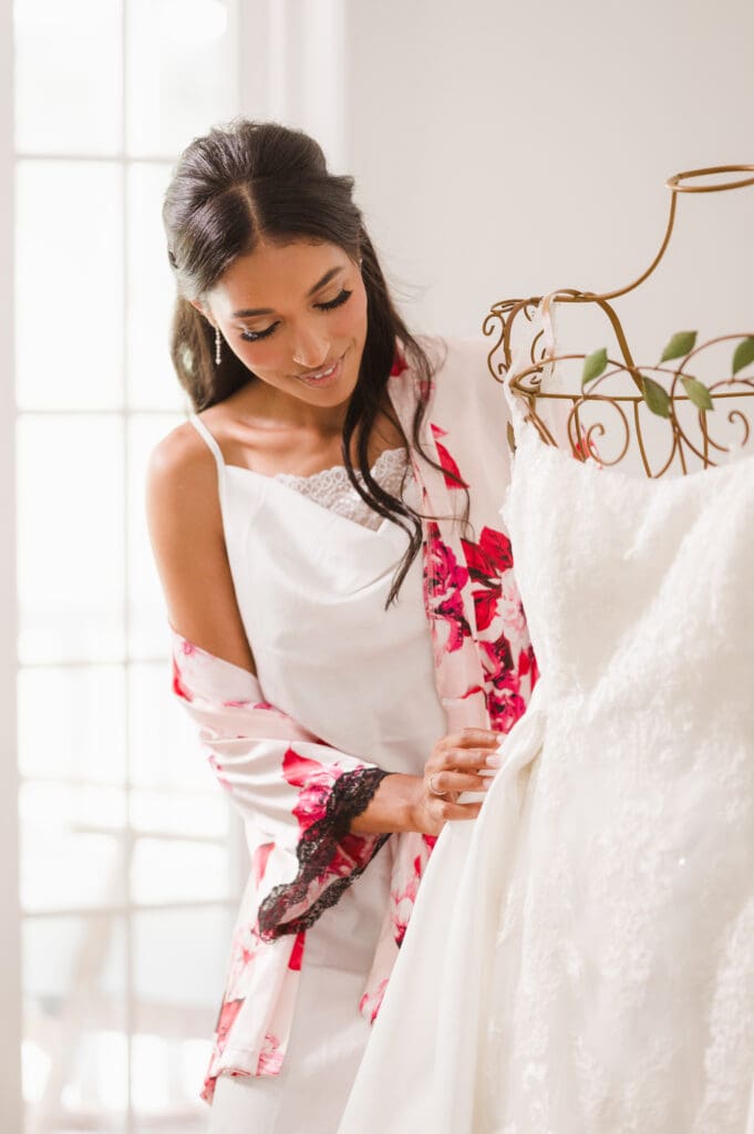 bride-prep-with-the-dress-and-bride-on-wedding-day-by-suess-moments-photography