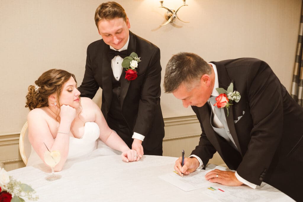signing-the-marriage-license-at-the-madison-hotel