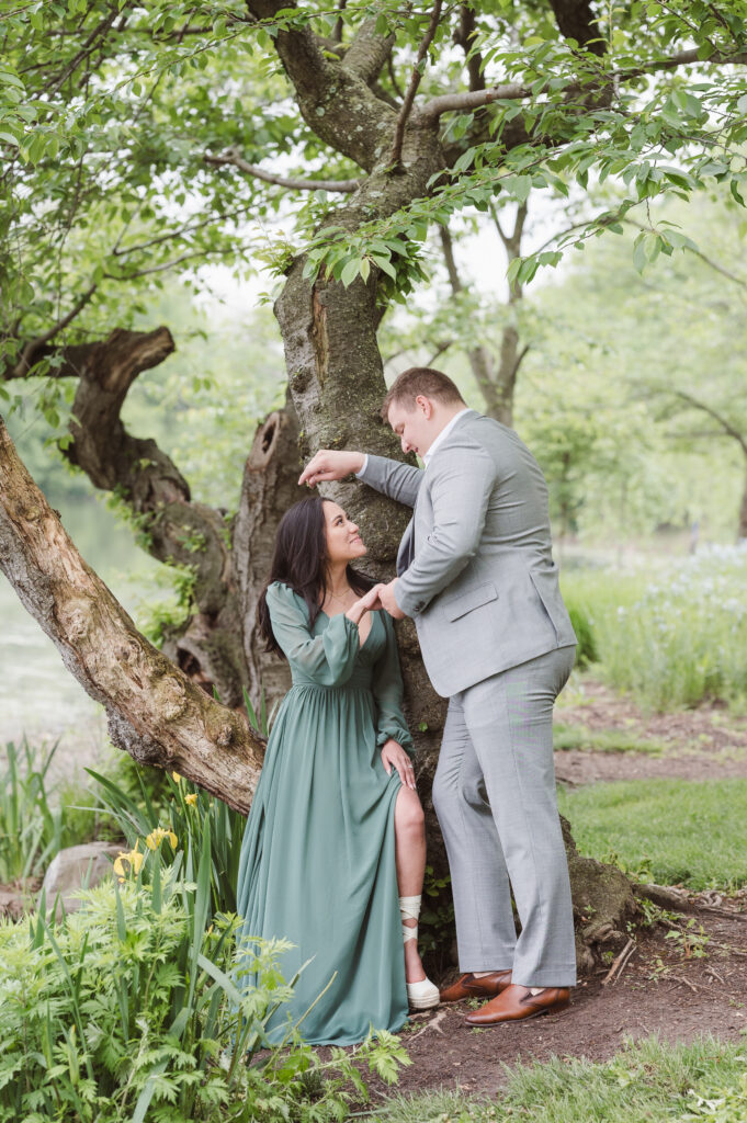 guy-on-tree-with-girl-sitting-on-tree