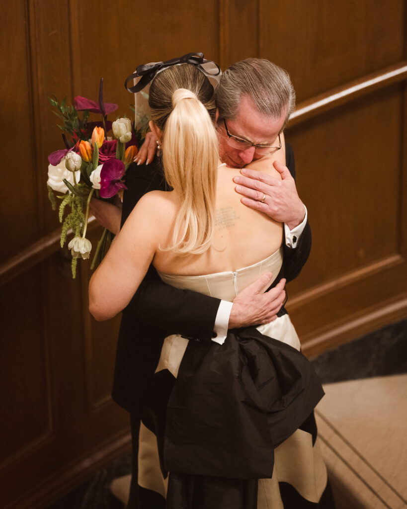 bride-and-father-first-look-on-stairs