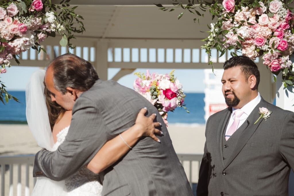beach-wedding-ceremony-at-windows-on-the-water-nj-venue-by-suess-moments-photography