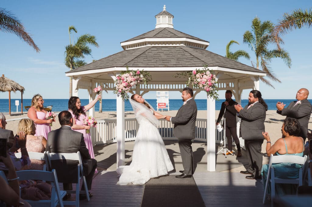beach-wedding-ceremony-at-windows-on-the-water-nj-venue-by-suess-moments-photography